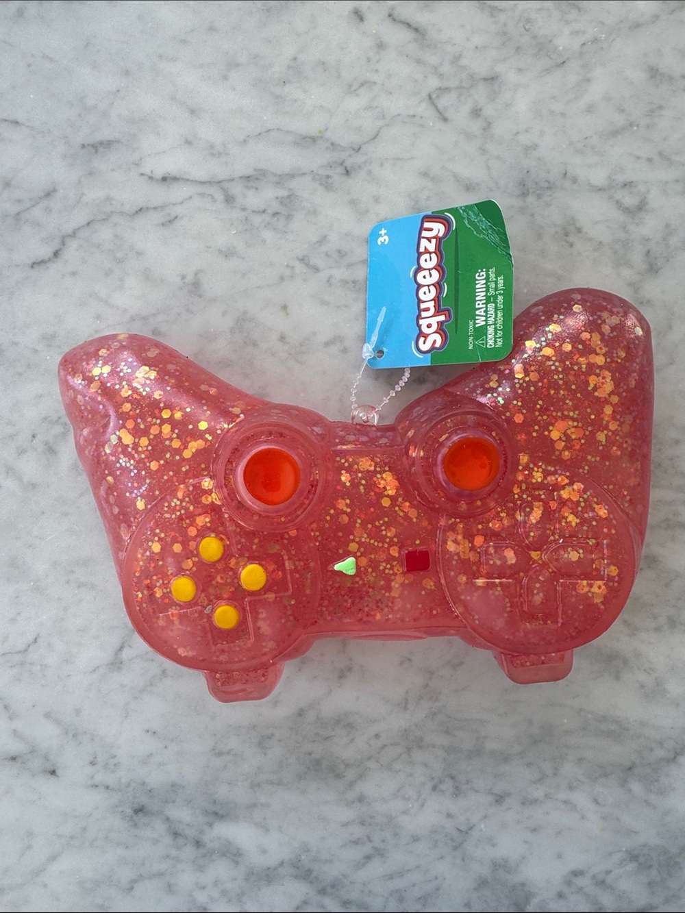 Squeeze Pink Glitter Game Controller Toy with Yellow Buttons